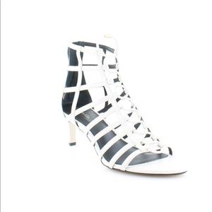 {{{Sold}}}     Calvin Klein White Heels